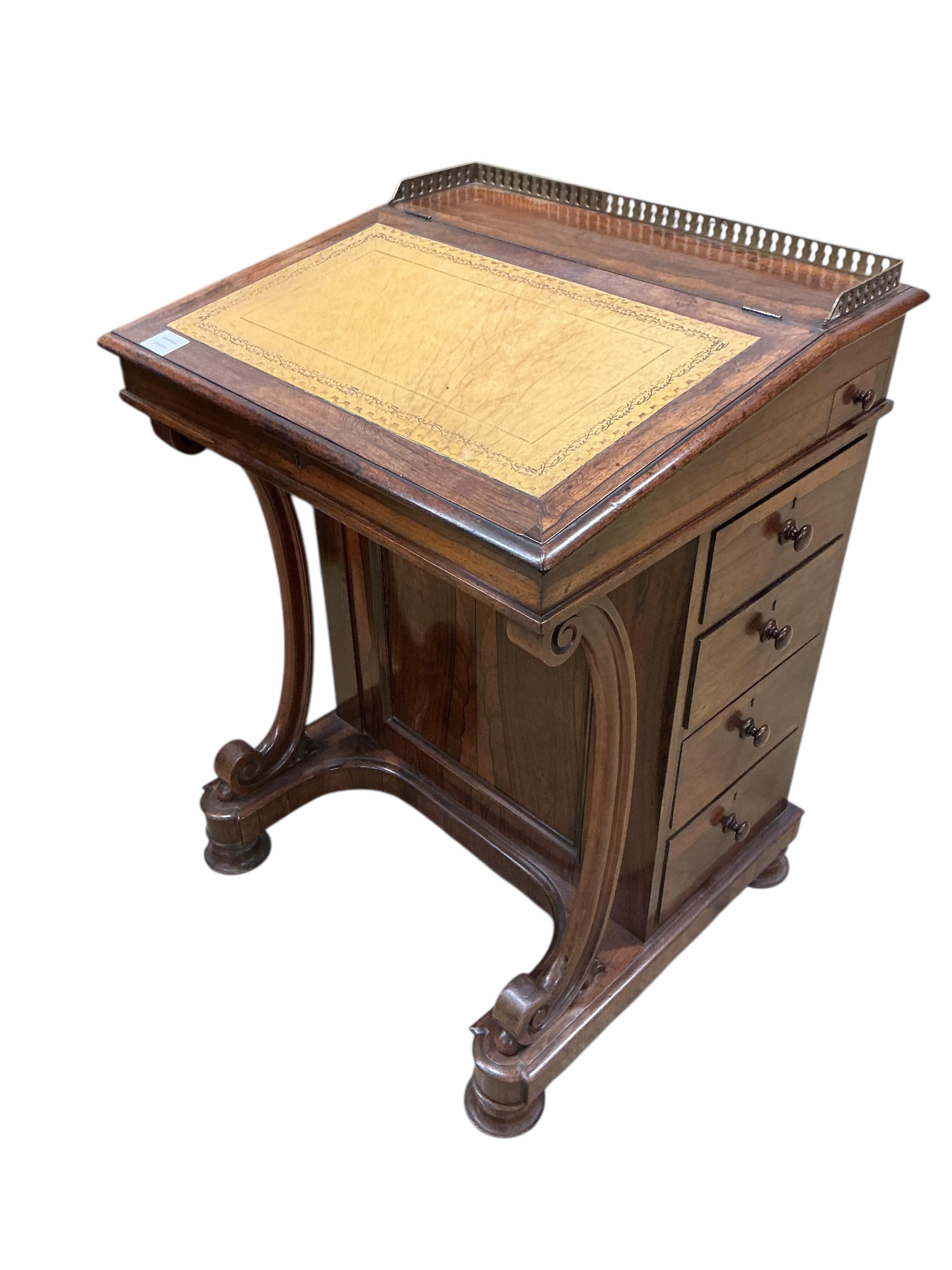 An early Victorian rosewood Davenport, width 60cm, depth 54cm, height 83cm